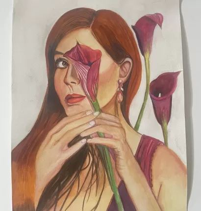 Woman with calla lily over one eye